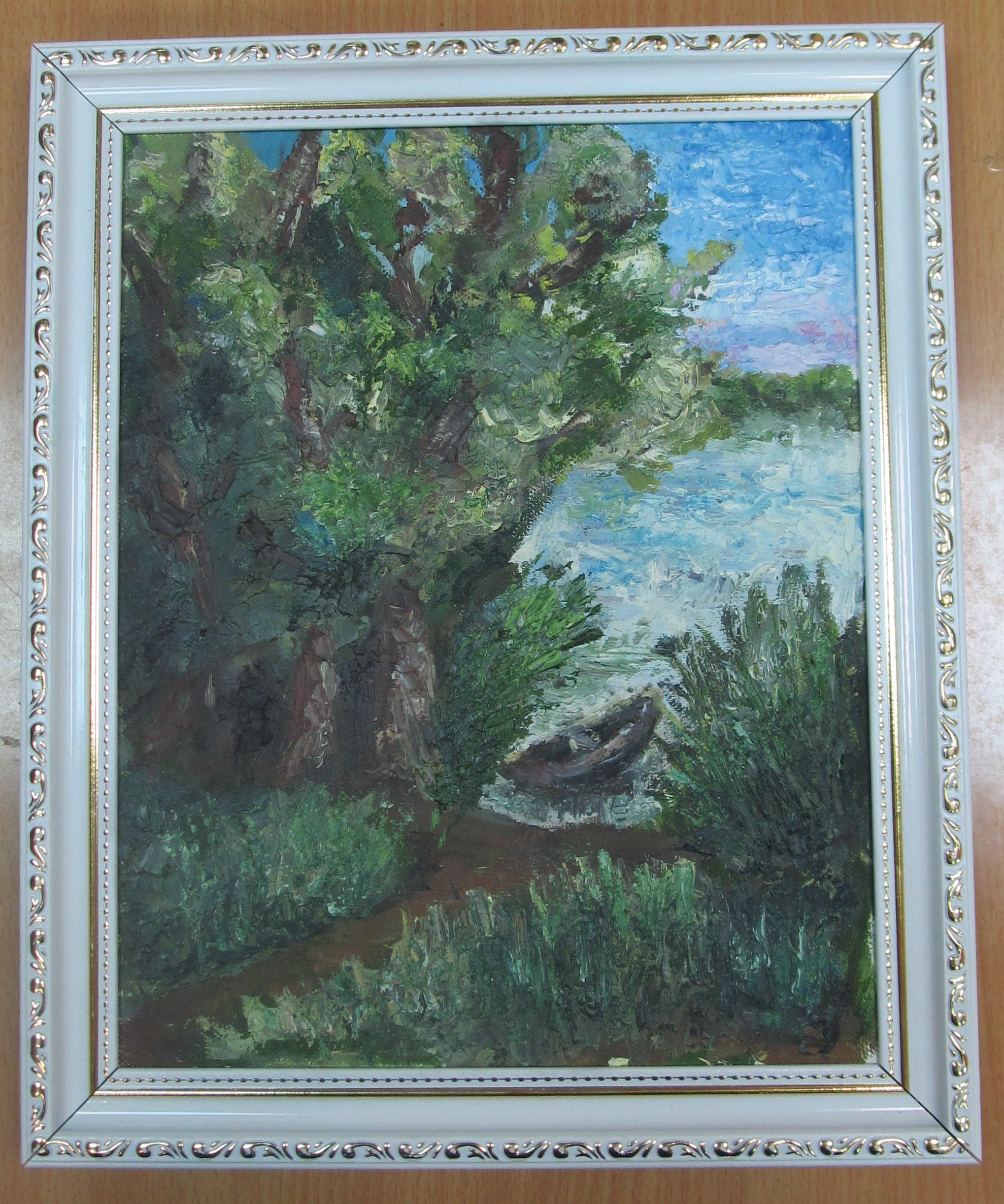 У реки